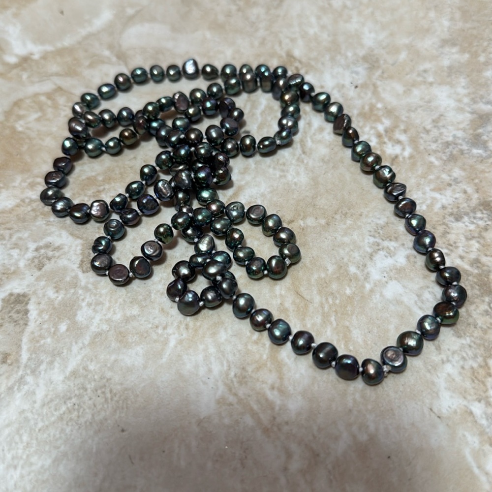 Fresh water pearls 
Long necklace